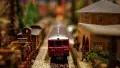 Photo of a miniature red train.