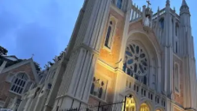 Exterior shot of large brick and stone cathedral