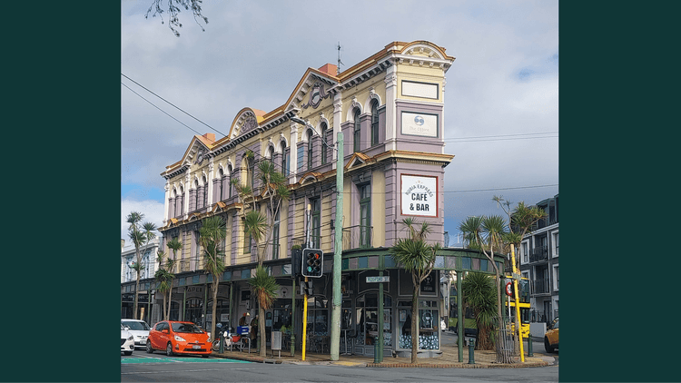 Colour photograph of a brick building from the road
