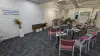 Interior shot of chairs around a podium