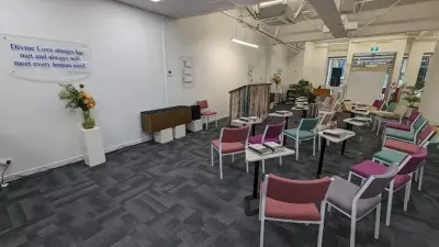Interior shot of chairs around a podium