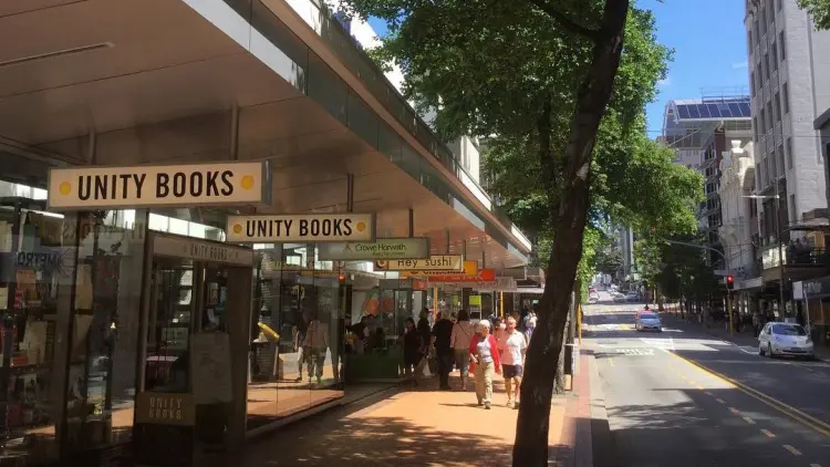 Exterior shot of a bookshop with trees nearby