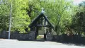 Church surrounded by green trees
