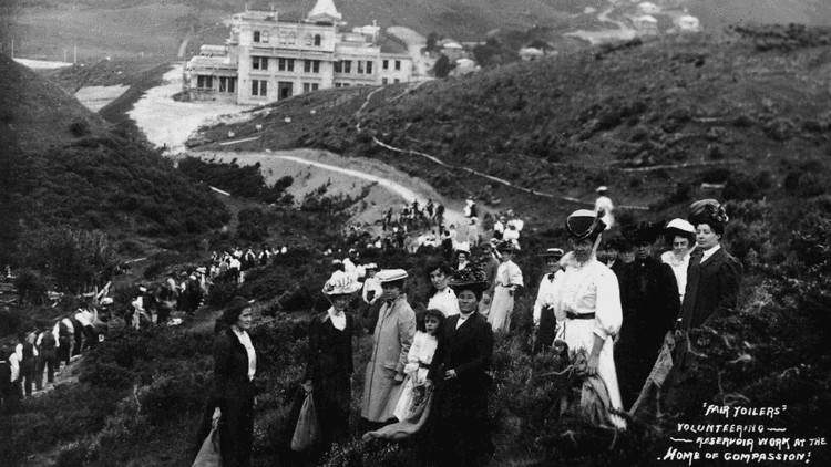 Black and white image of women doing volunteer work at the Home of Compassion 