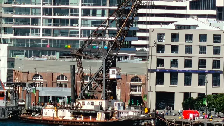 Buildings behind a boat on water