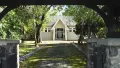 St John's Trentham Church sits at the end of a moss-covered driveway shaded either side by trees