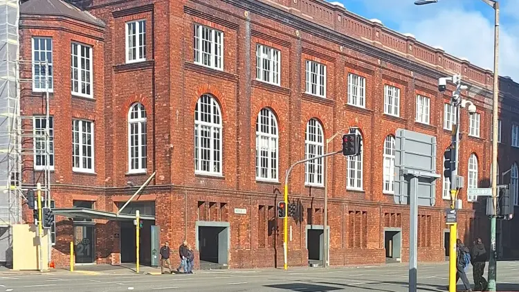 Large brick building in a city