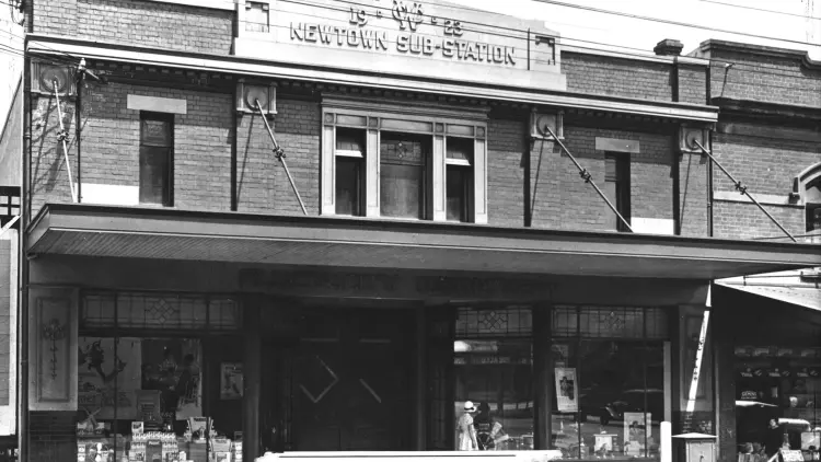 Black and white photograph of a shop