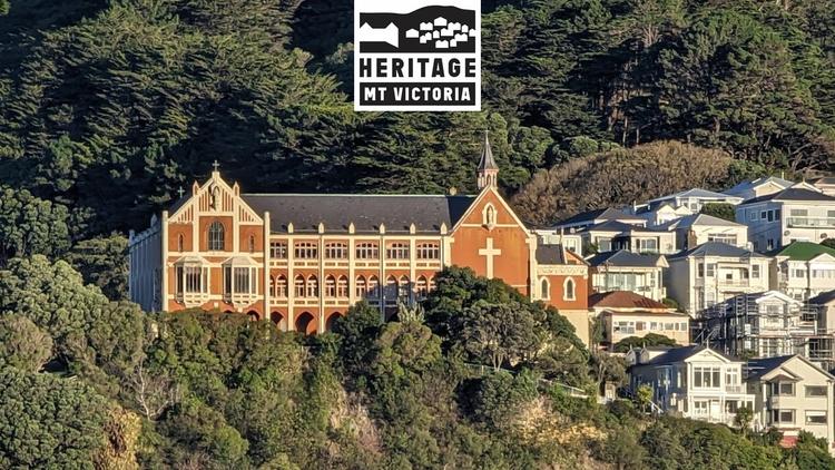 A brick church in the hills during sunset.