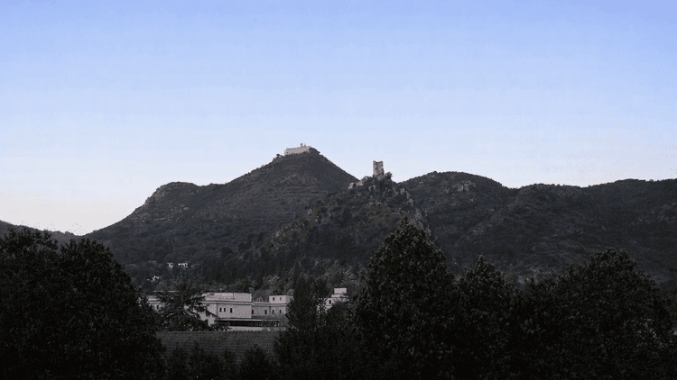 Hills in front of a light blue sky