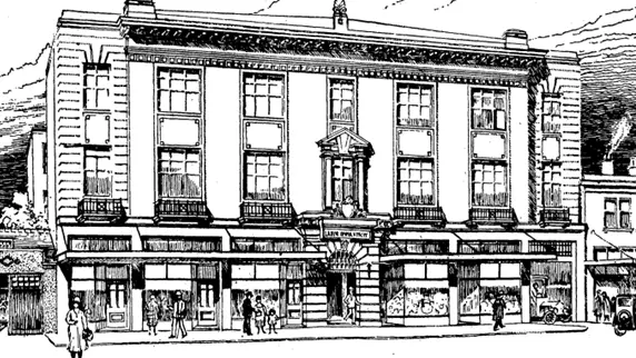 Pencil sketch of a brick building with signature on bottom right