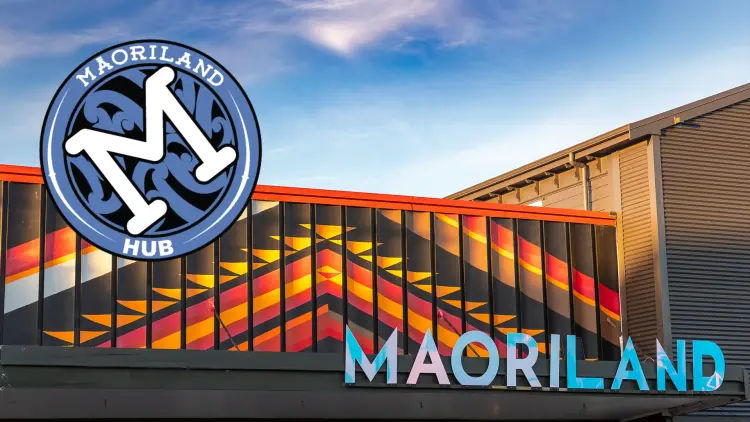 Exterior shot of colourful building reading Maoriland