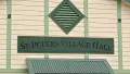 Exterior shot of building reading St Peter's Village Hall
