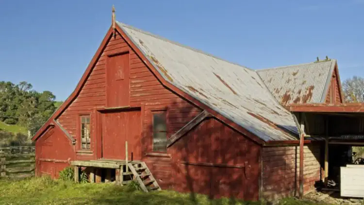 Exterior shot of a red woolshed