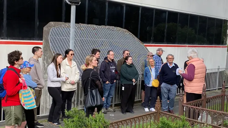 Group of people standing outside a building