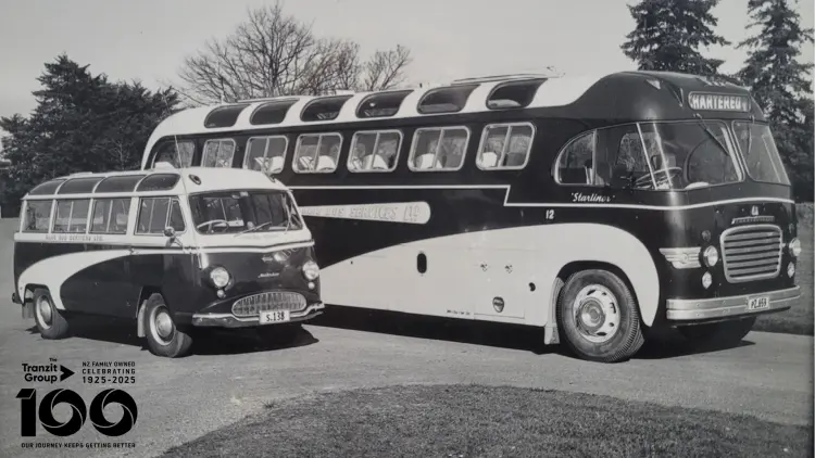 Two old buses in black and white