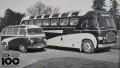 Two old buses in black and white