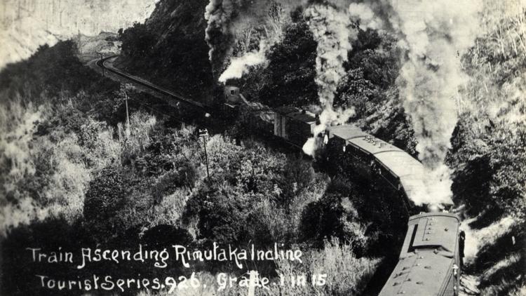 Old photo of Rimutaka rail incline showing a train with multiple carriages 