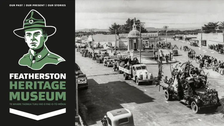Black and white photo of the Featherston war memorial and surrounding streets. The Featherston Heritage Museum logo is on the left side.
