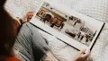 A person holding a photograph collage