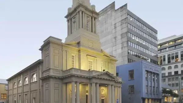 Exterior shot of tall church in concrete