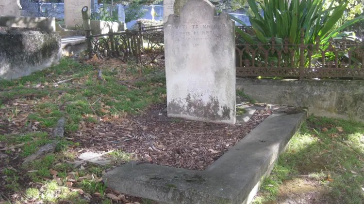 Stone headstone in a graveyard