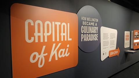Entranceway to Capital of Kai exhibit at Wellington Museum. The text reads 'Capital of Kai, how Wellington became a culinary paradise'.