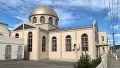 Exterior shot of a large domed building