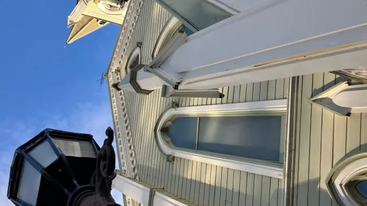 Exterior shot of a historic wooden church.