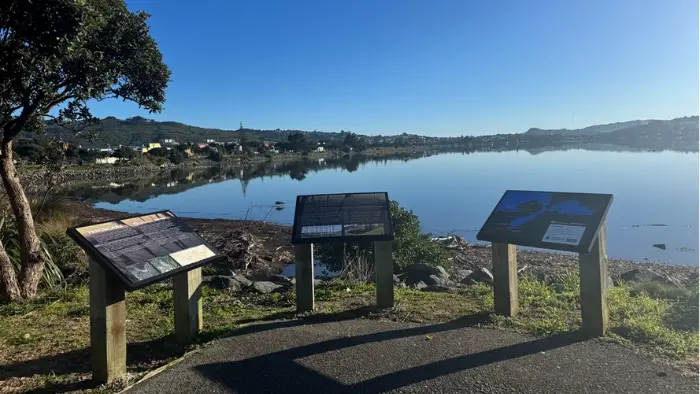Porirua harbour and three trial signs